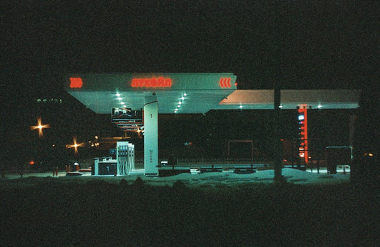 Atmospheric night view of an illuminated gas station in Saint Petersburg, Russia.